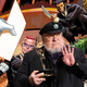 George R.R. Martin, holding an Emmy won by Game of Thrones, atop a background featuring art from Marvel's X-Force #20